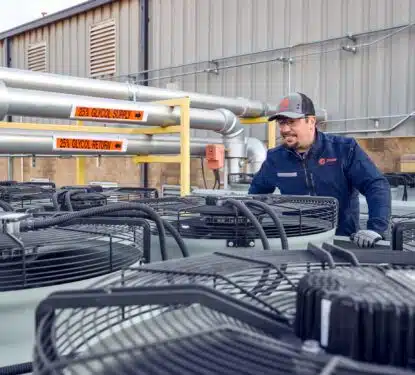 Trane Technician inspecting units