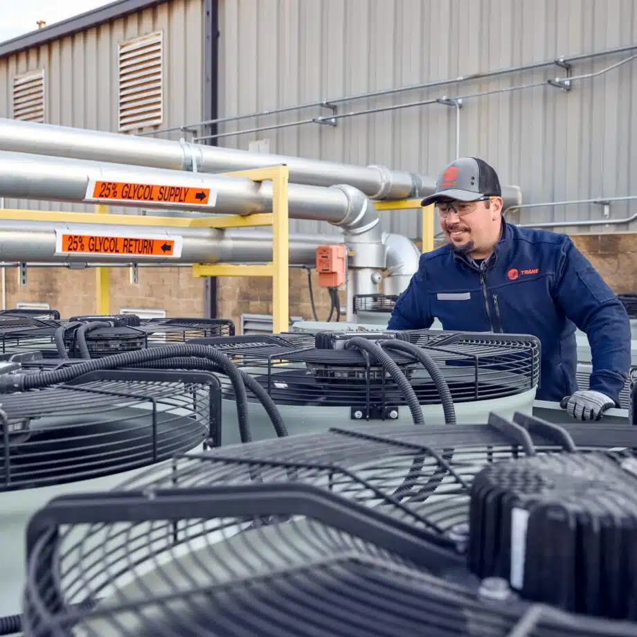 Trane Technician inspecting units